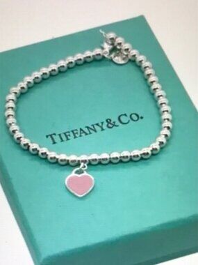Tiffany & Co. Silver Bracelet with Pink Heart Charm